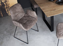Tonon Step armchair soft upholstered with sled base in contemporary dining interior